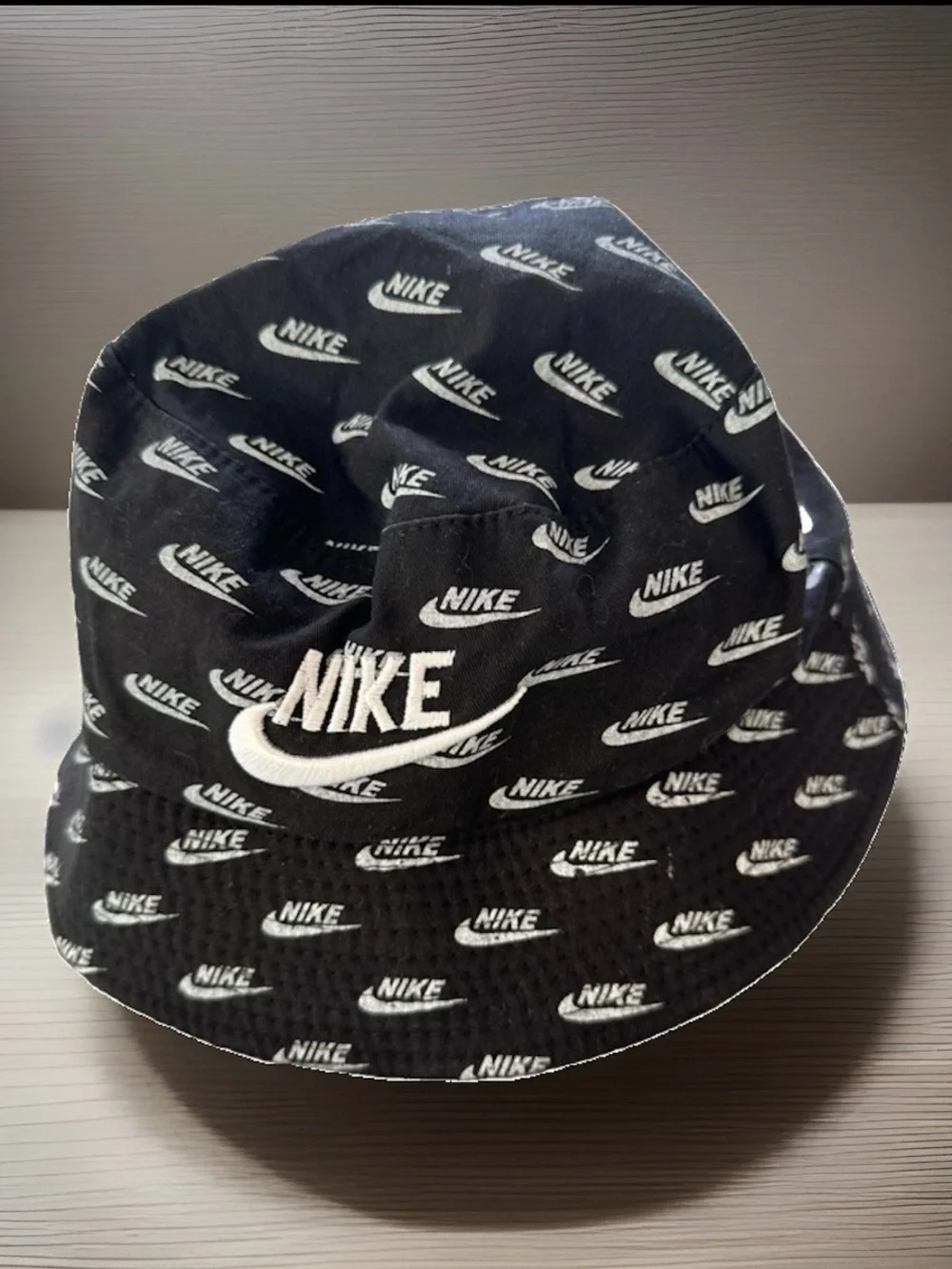 Nike Black Bucket Hat with White Swoosh